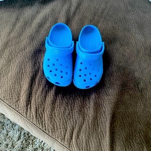 Blue crocs size 5 boys. Very gently used.